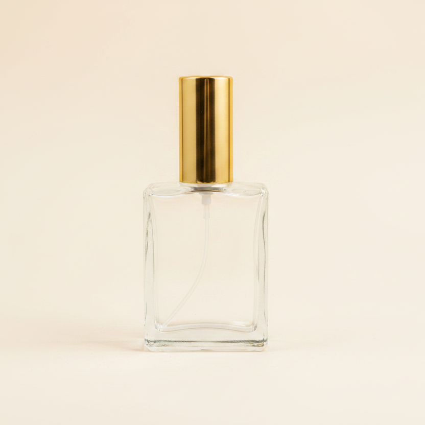 Bottle with dip tube on warm cream background