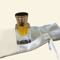 Gold Cap Bottle on Satin Pouch - Warm Cream